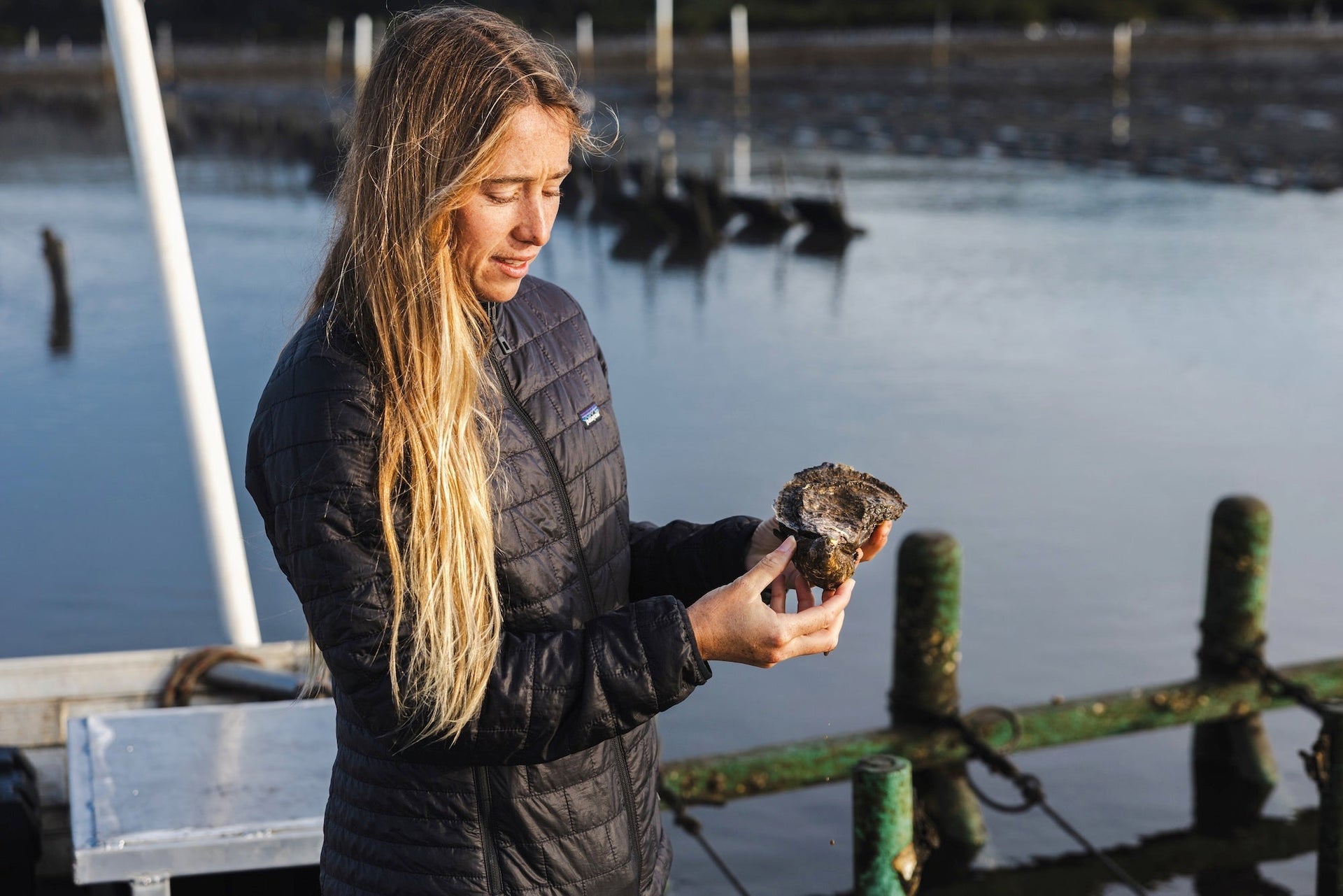 Opening image: The author, Tully White checking out a healthy Pacific oyster, fresh out of the Bhundoo River. Photo Matt Dunbar