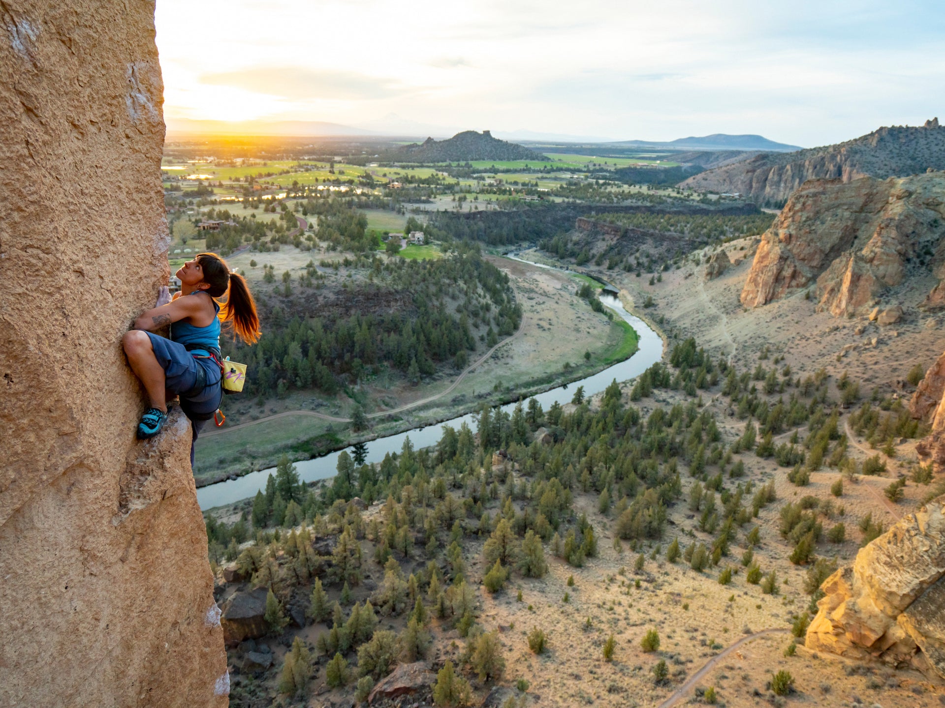 Tara Kerzhner climbs The Backbone (5.13a) of The Monkey at Oregon’s Smith Rock State Park, also known as Animal Village. Photo: Jules Jimreivat
