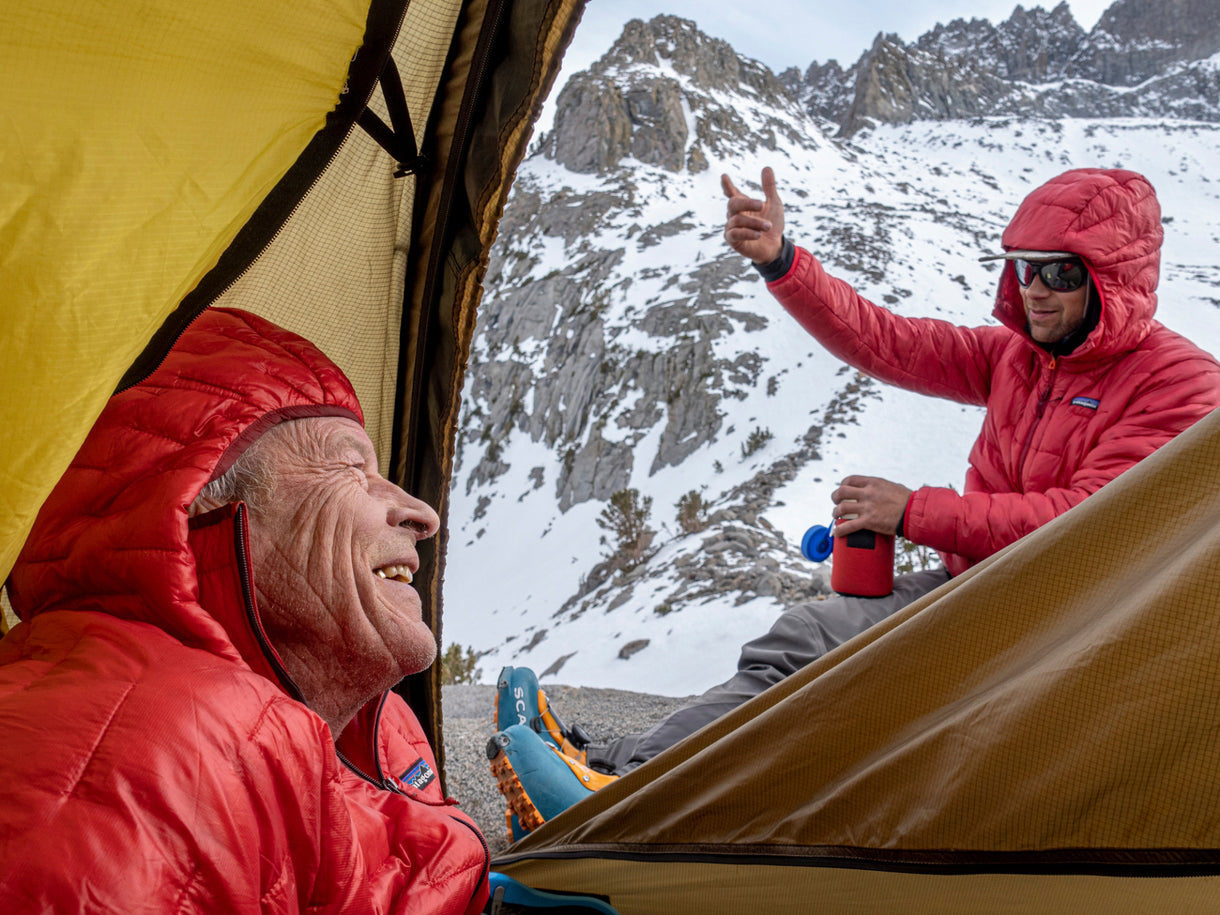 George Lowe (left) and Joel Kauffman (right) share stories while camped beneath Palisade Crest in the Sierra Nevada, California.