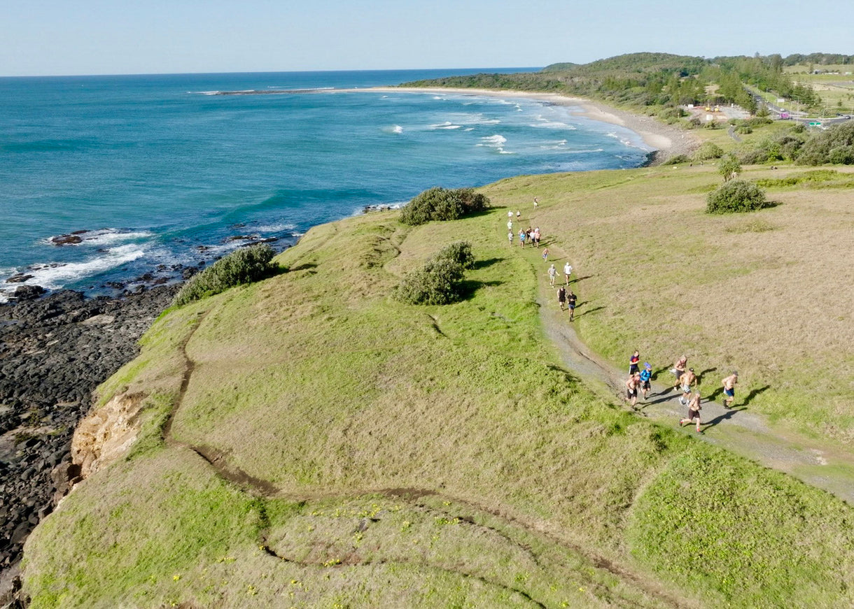 Opening image: The lead runners head up Skennars Head, on their way north, running for clean rivers. Photo Liam O’Brien