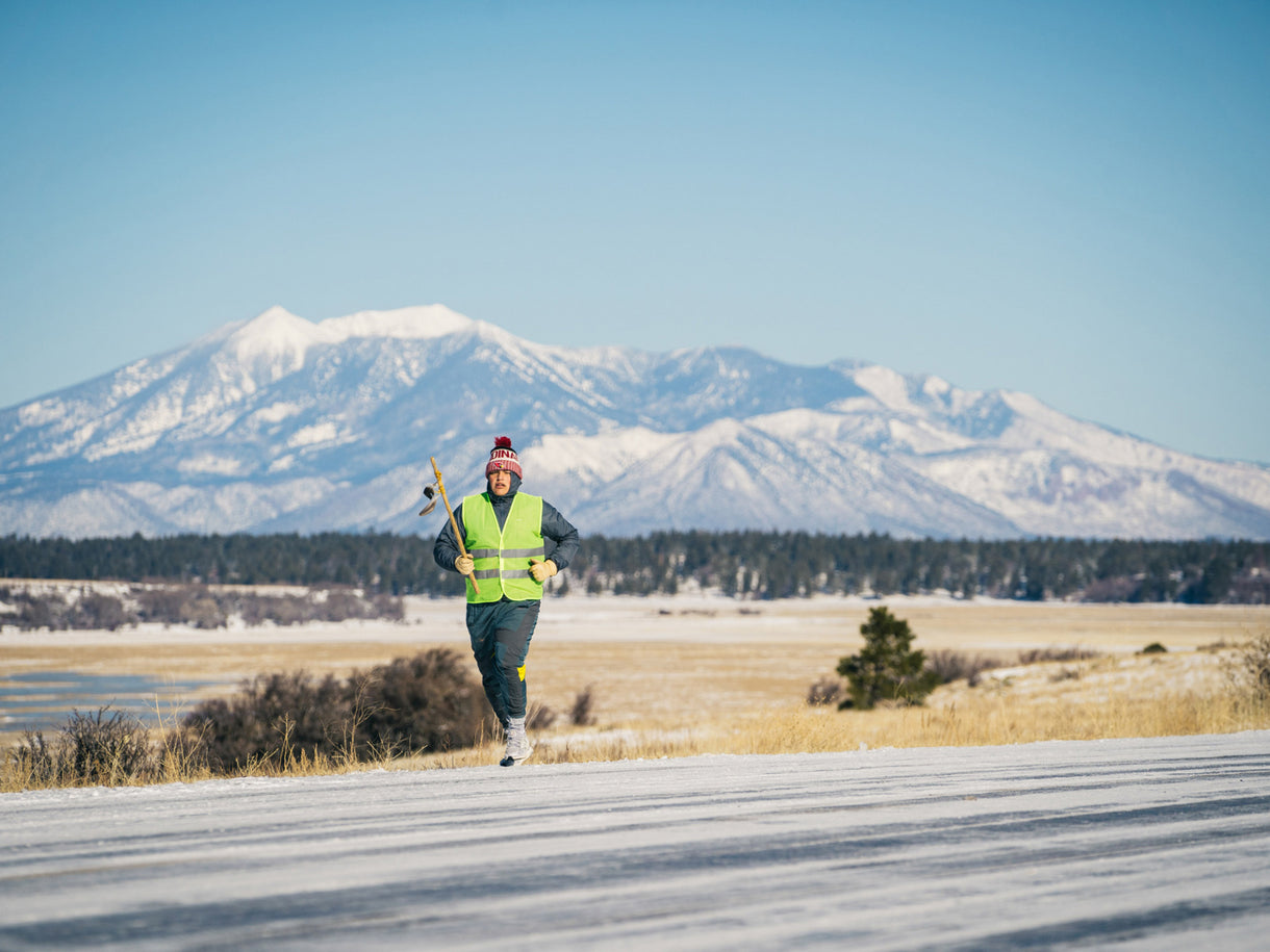 Holden Wilson (Diné) completing one of the first legs of the 227-mile run from Doko’oo’sliid (the San Francisco Peaks) to the sacred Apache land of Oak Flat.