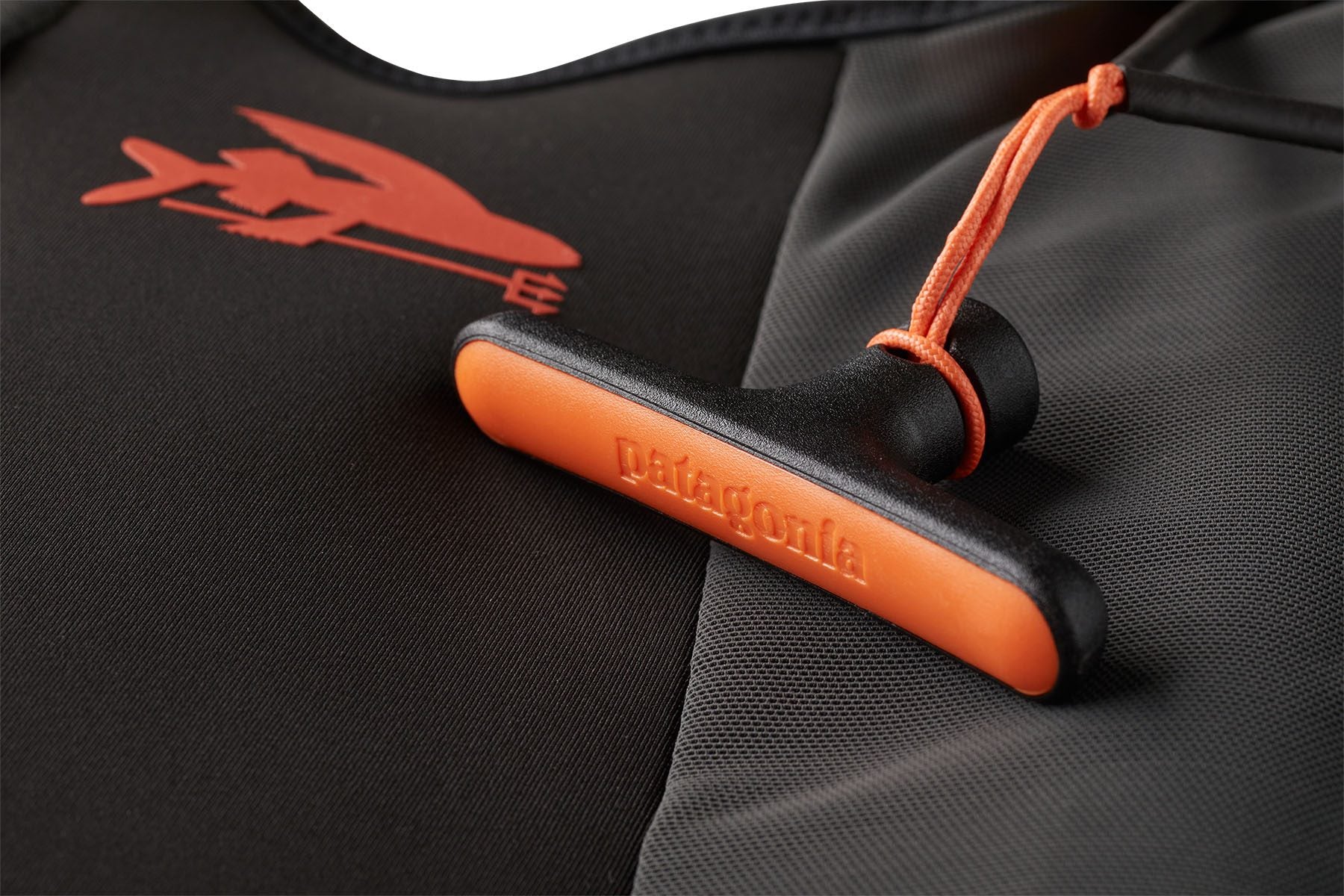 Close-up of the orange pull tab on the PSI Vest 2.0.